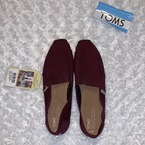 NWT Toms canvas slip ons. Burgundy/wine colored
